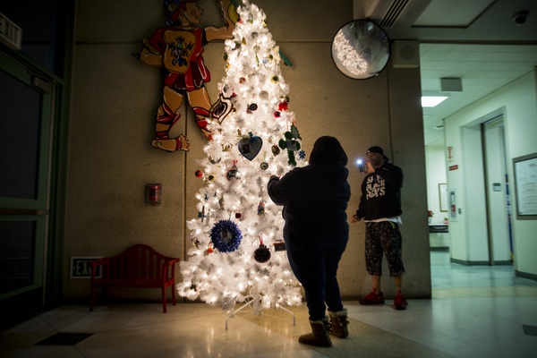An ornament and a memory: Families who lost loved ones trim a tree in annual LAPD event