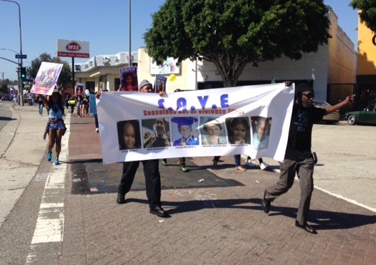 To grieve 7-year-old boy, family demonstrates against violence