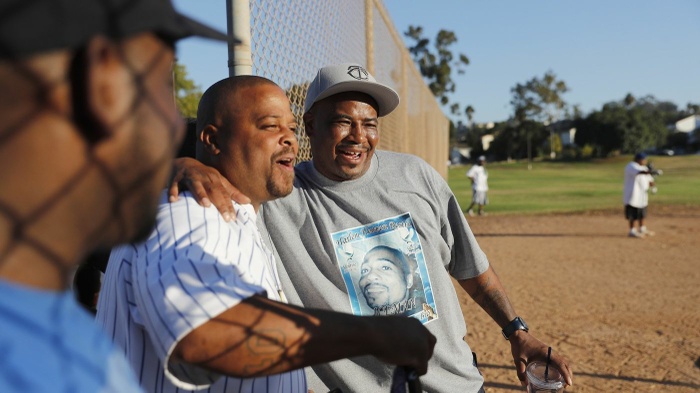Three suspects arrested in killing of gang intervention worker celebrated as a peacemaker