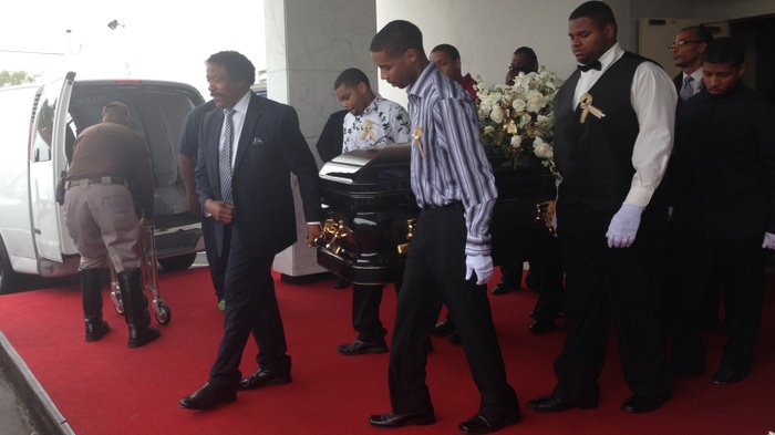 At funeral for teenager shot over red shoes, grief and denouncements of gang violence