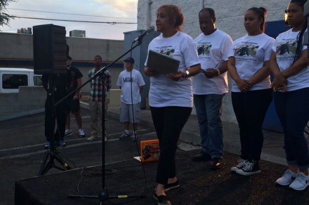 'We each have a role to play,' pastor says, marking six months since a young father's death